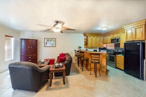 Deluxe Duplex, 2 Bedrooms | Living area | Flat-screen TV, DVD player