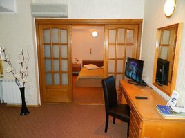 Superior Suite, 1 Bedroom, Smoking, City View | Minibar, in-room safe, desk, rollaway beds