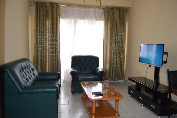 Huoneisto, 1 makuuhuone | Oleskelualue | Televisio