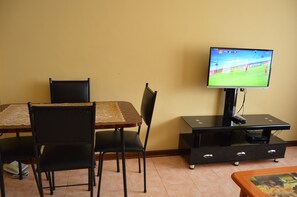 Apartment, 1 Bedroom | Living area | TV