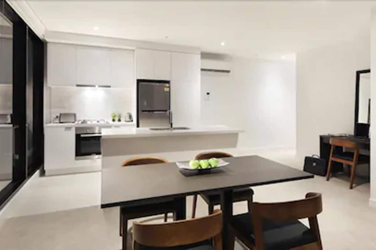 Two Bedroom Deluxe Apartment | Private kitchen | Full-size fridge, microwave, oven, stovetop