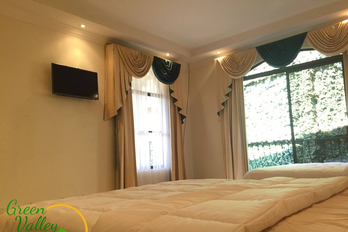 Chambre Quadruple Deluxe, vue jardin
