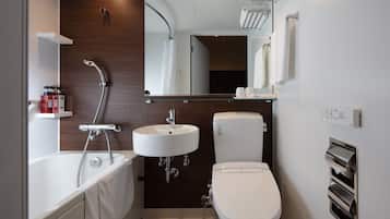 Combined shower/tub, free toiletries, hair dryer, slippers