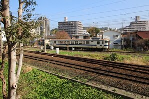 Trains depart from this bustling urban station, offering easy access to various destinations.