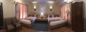 Deluxe Cottage, 1 King Bed, Garden View | Air conditioning - Jungle Safari Resort (Sauraha)