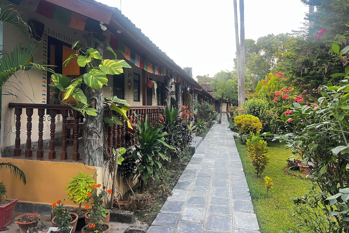 ChaumiĂšre Deluxe, 1 trĂšs grand lit, vue sur le jardin | Vue du balcon