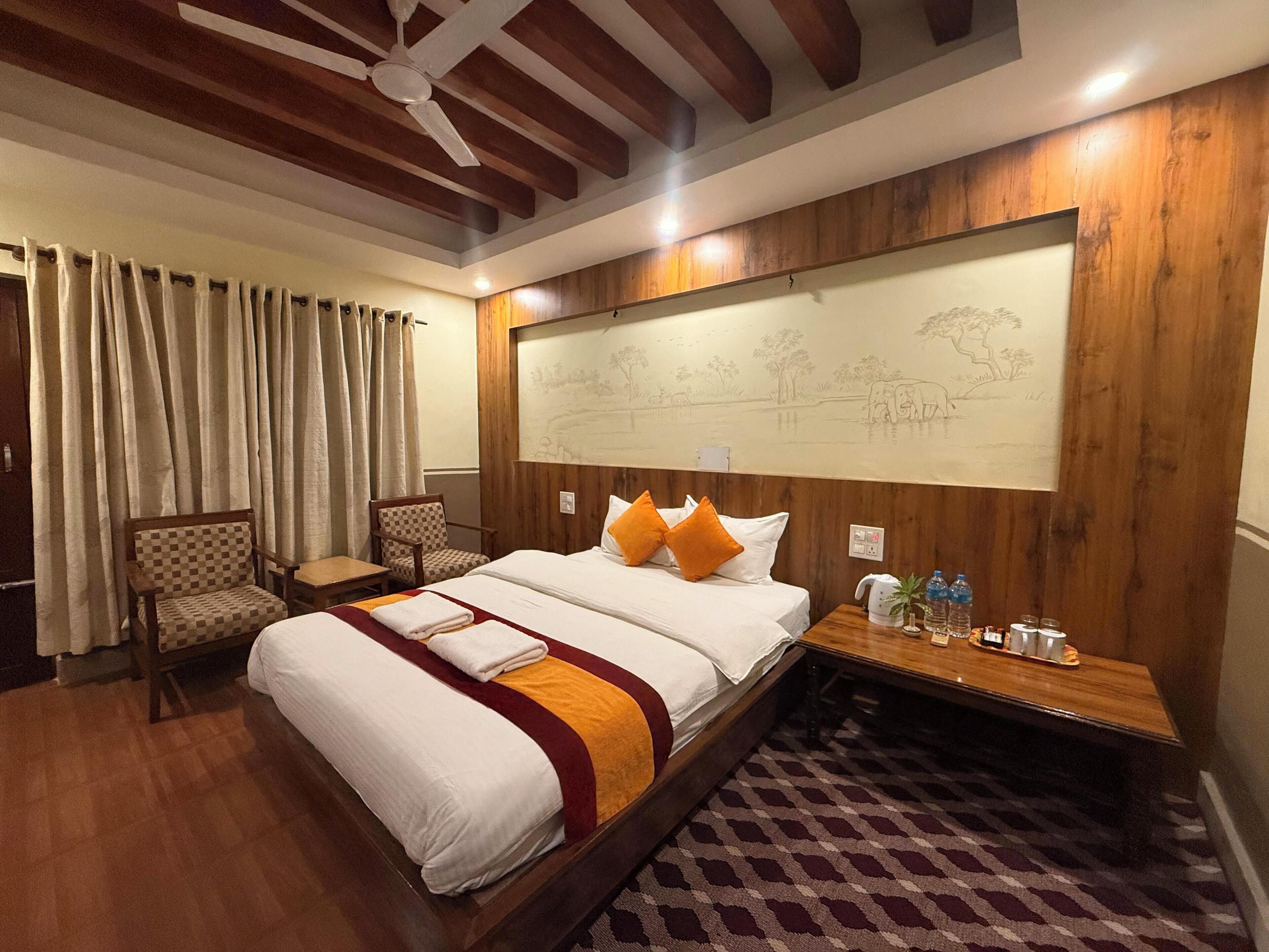 Habitación Deluxe | Caja de seguridad en la habitación y escritorio 