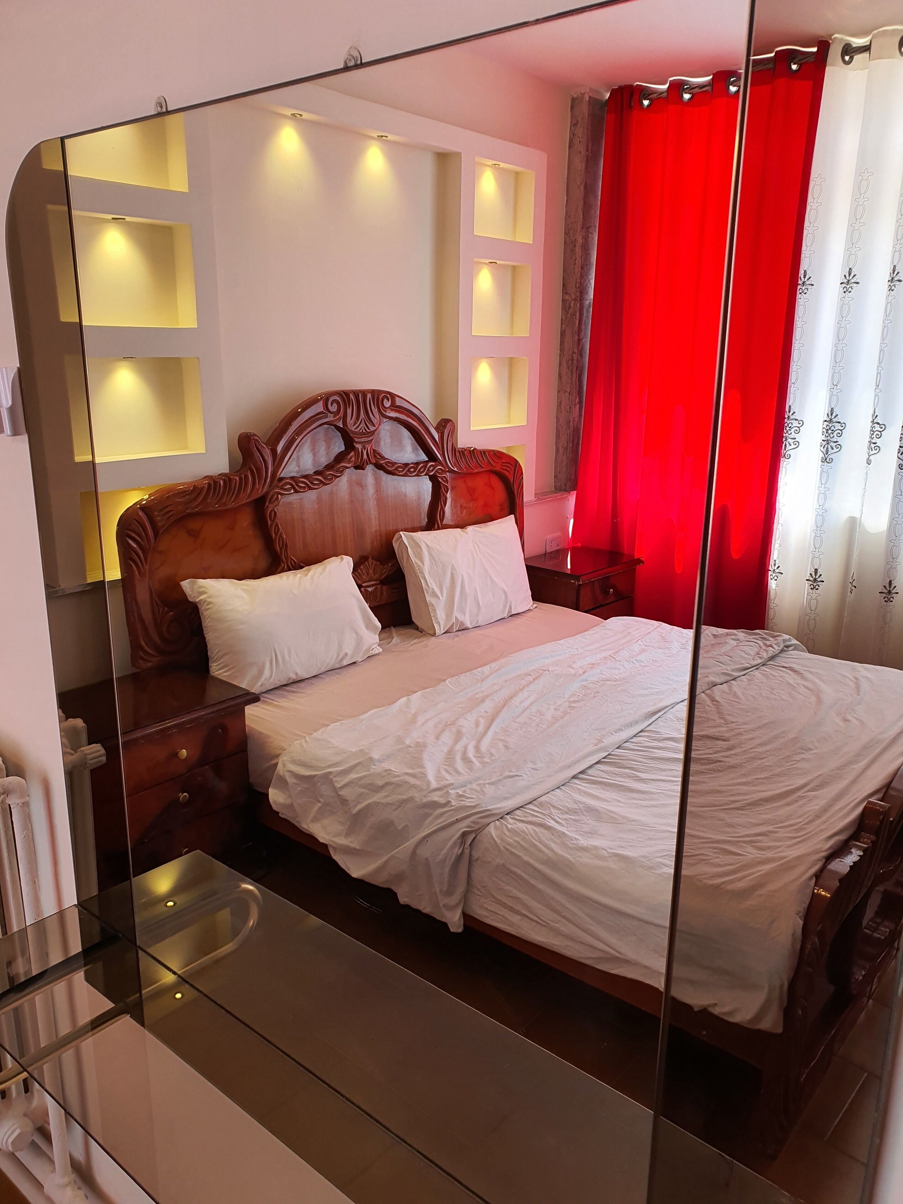 Apartment, 1 Bedroom | Minibar, desk, laptop workspace, iron/ironing board