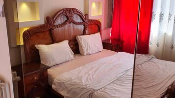 Apartment, 1 Bedroom | Minibar, desk, laptop workspace, iron/ironing board