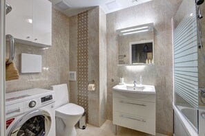 Deluxe Apartment, Lanai | Bathroom | Combined shower/bathtub, free toiletries, hair dryer, bathrobes - Boutique Apartments Classic (St. Petersburg)