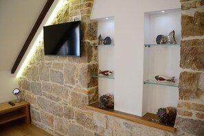 Superior studio suite, 1 tweepersoonsbed met slaapbank, keuken, op Executive verdieping | Woonruimte | Smart-tv en Netflix