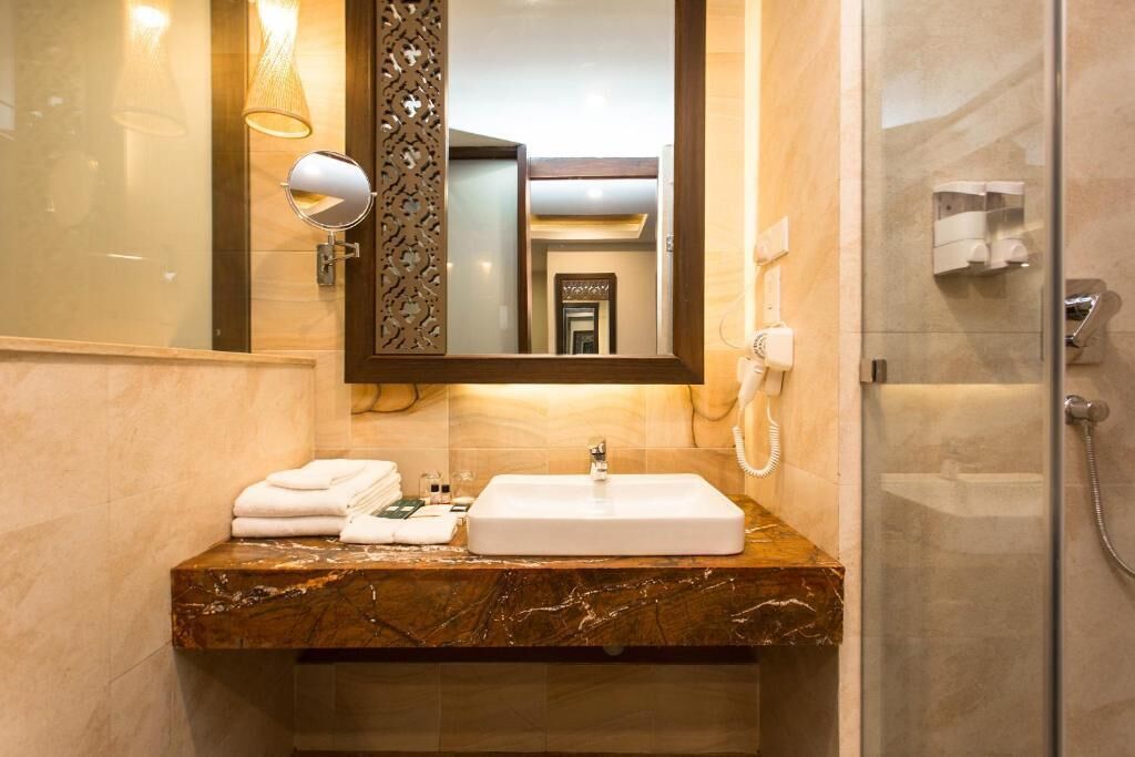 family triple room, mountain view | bathroom | free toiletries, hair dryer, slippers, towels