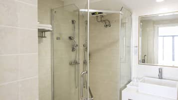 Shower, free toiletries, hair dryer, slippers