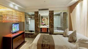 Deluxe King Room | In-room safe, desk, blackout drapes, iron/ironing board