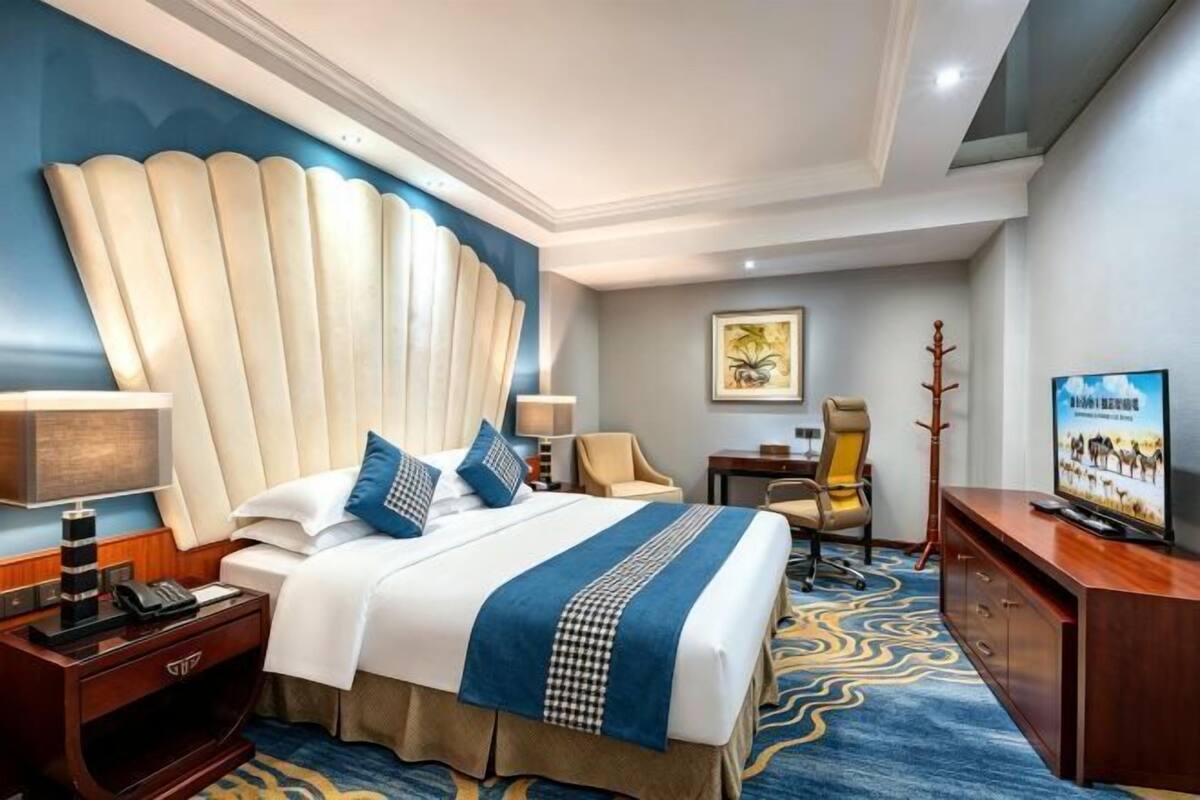 In-room safe, desk, blackout curtains, iron/ironing board