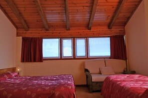 Standard Triple Room, Mountain View | Down duvets, in-room safe, desk, cots/infant beds - Hotel Ristorante La Rosa (Teglio)