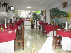 Breakfast, lunch, dinner served; local cuisine