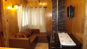Standard Cabin, 2 Bedrooms, Private Bathroom, Courtyard View | Living room | 42-inch LED TV with cable channels, TV