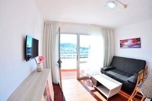 Flat-screen TV - Apartamentos Puerto Bello (Mogan)