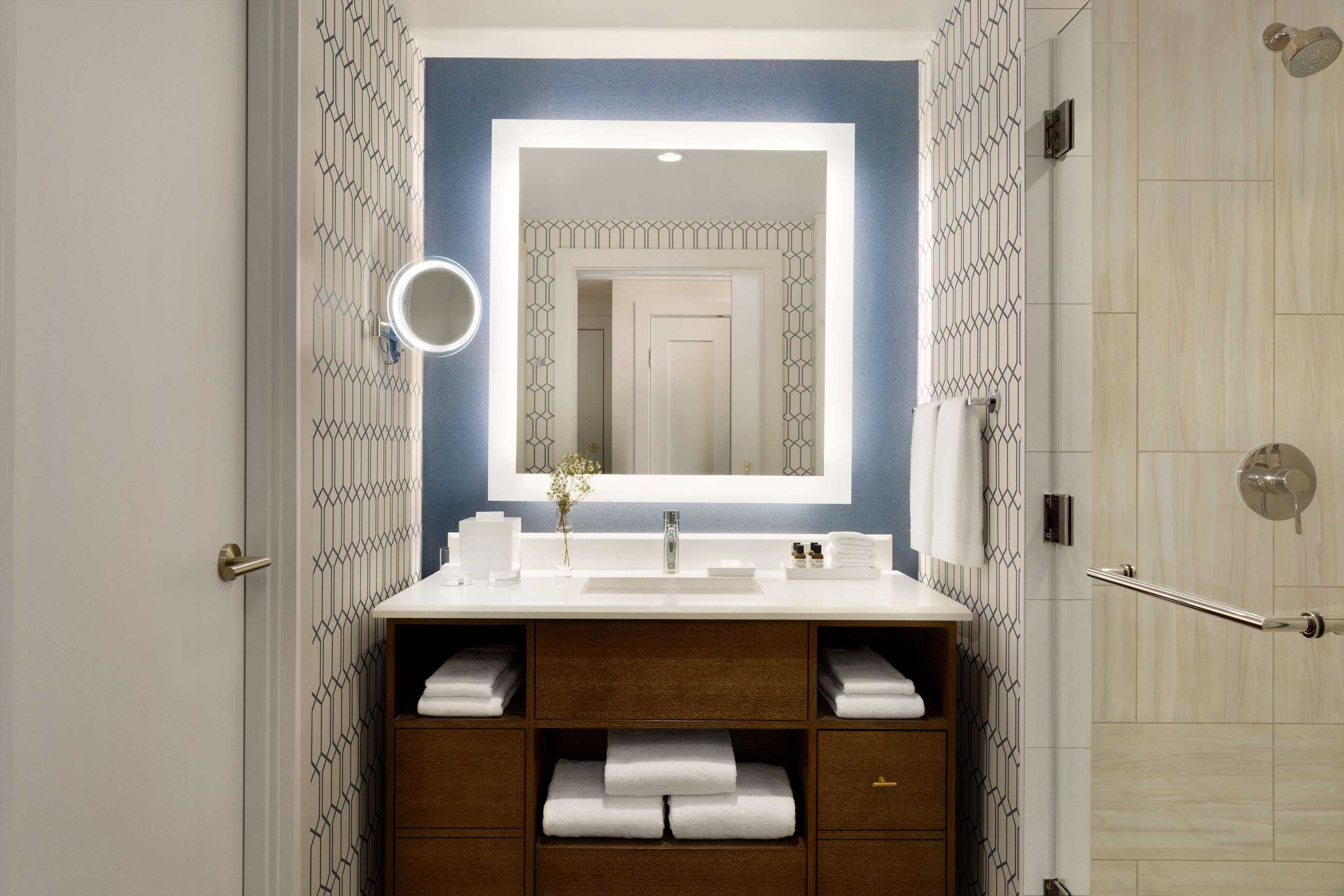 shower, designer toiletries, hair dryer, bathrobes