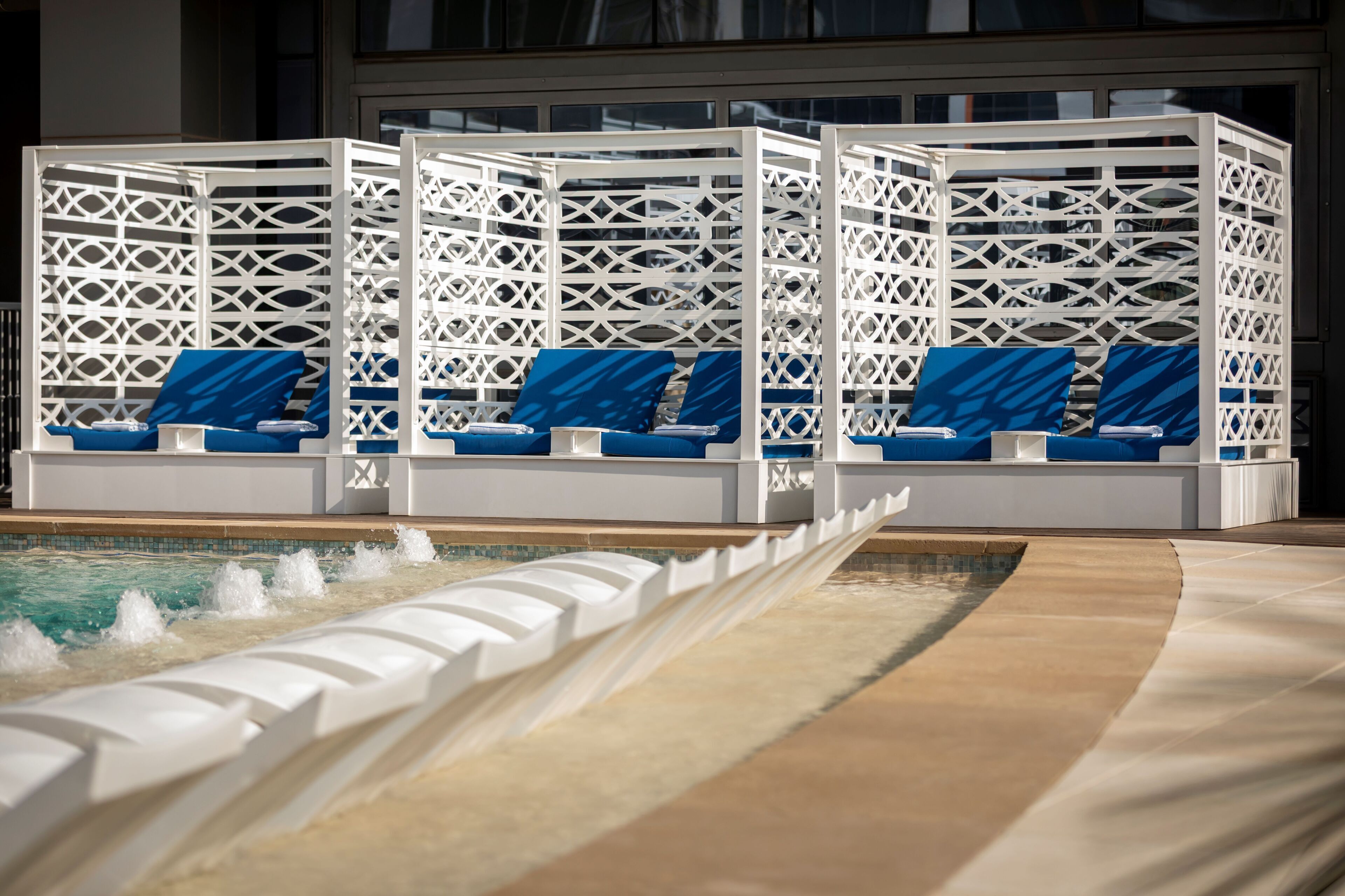 outdoor pool, a heated pool, pool cabanas (surcharge), pool umbrellas
