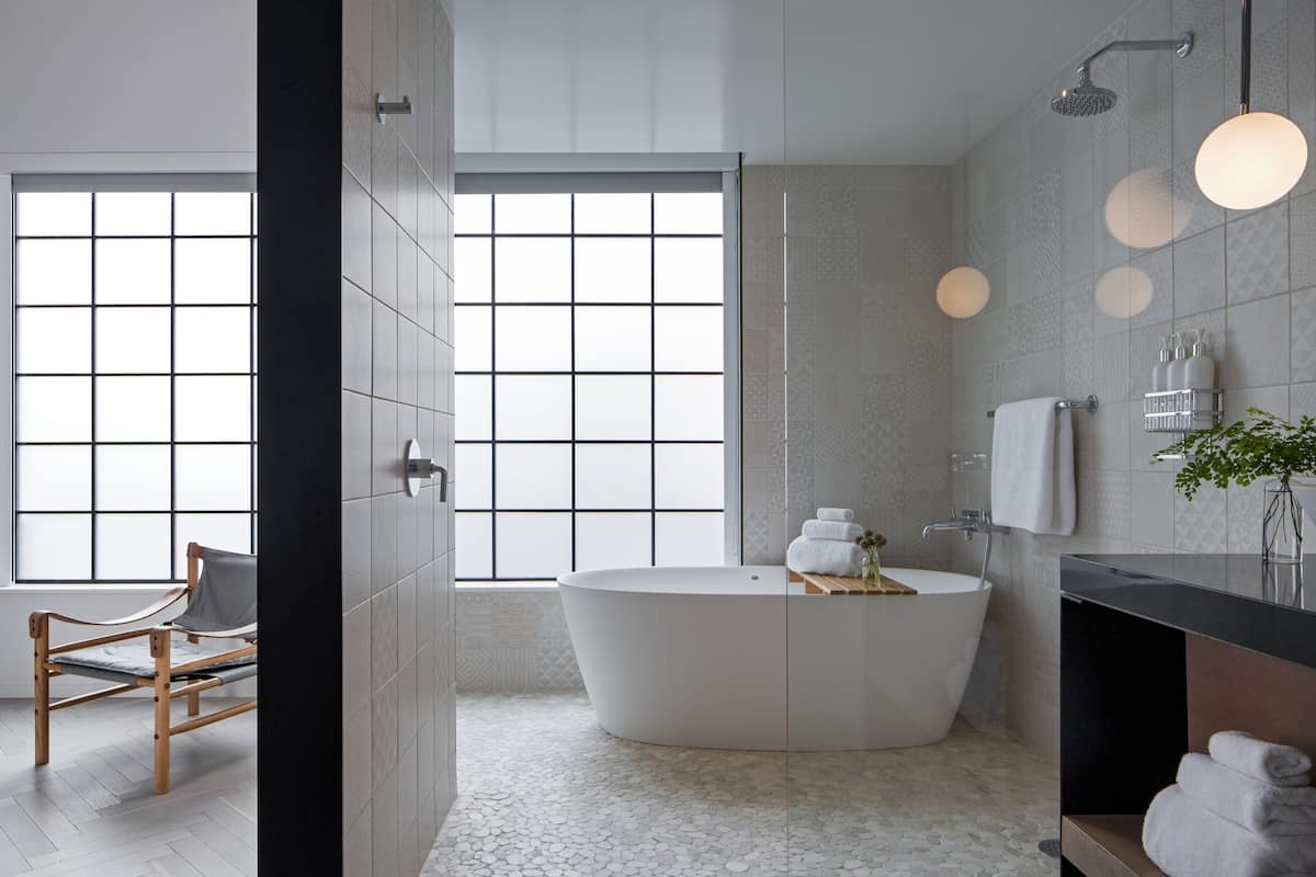 suite, 1 king bed (design) | bathroom | designer toiletries, hair dryer, bathrobes, slippers