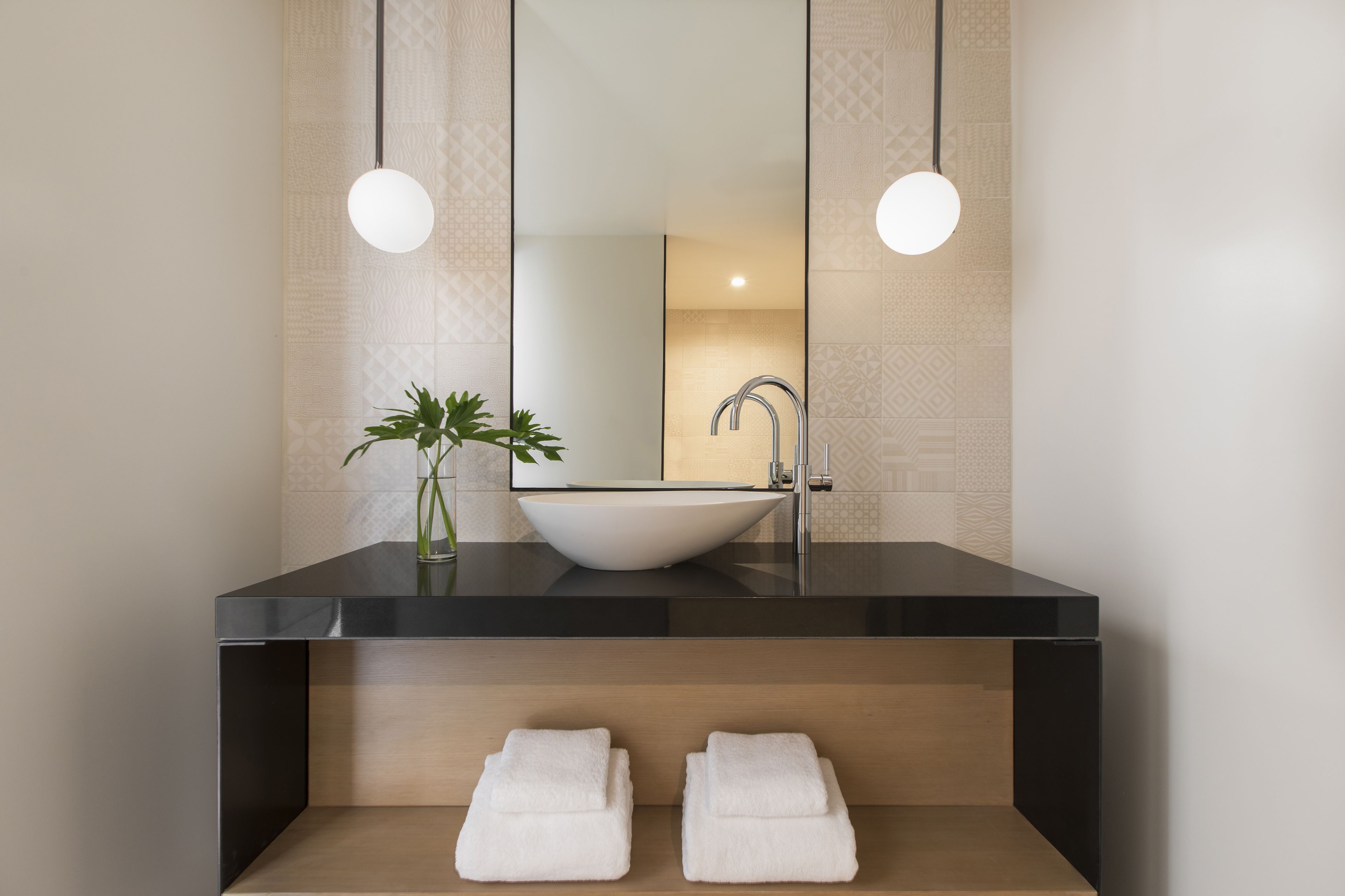 designer toiletries, hair dryer, bathrobes, slippers