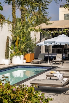 Pool amenities at Kimpton La Peer Hotel by IHG