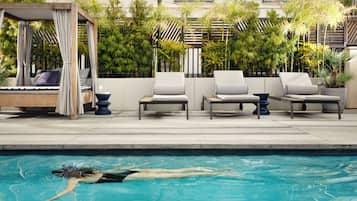 Outdoor pool, pool umbrellas, sun loungers