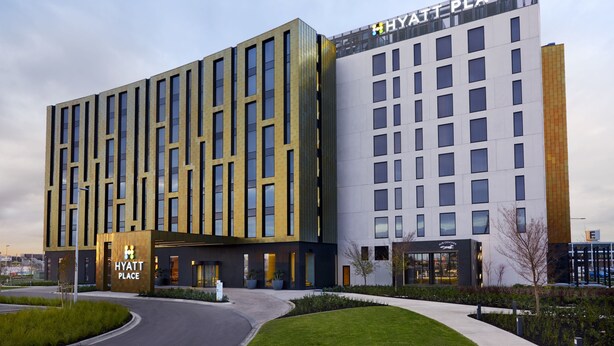 A modern hotel building with a prominent 'Hyatt Place' sign, featuring a clean, contemporary design with multiple floors and a well-maintained outdoor area. - Hyatt Place Melbourne, Essendon Fields (Essendon Fields)