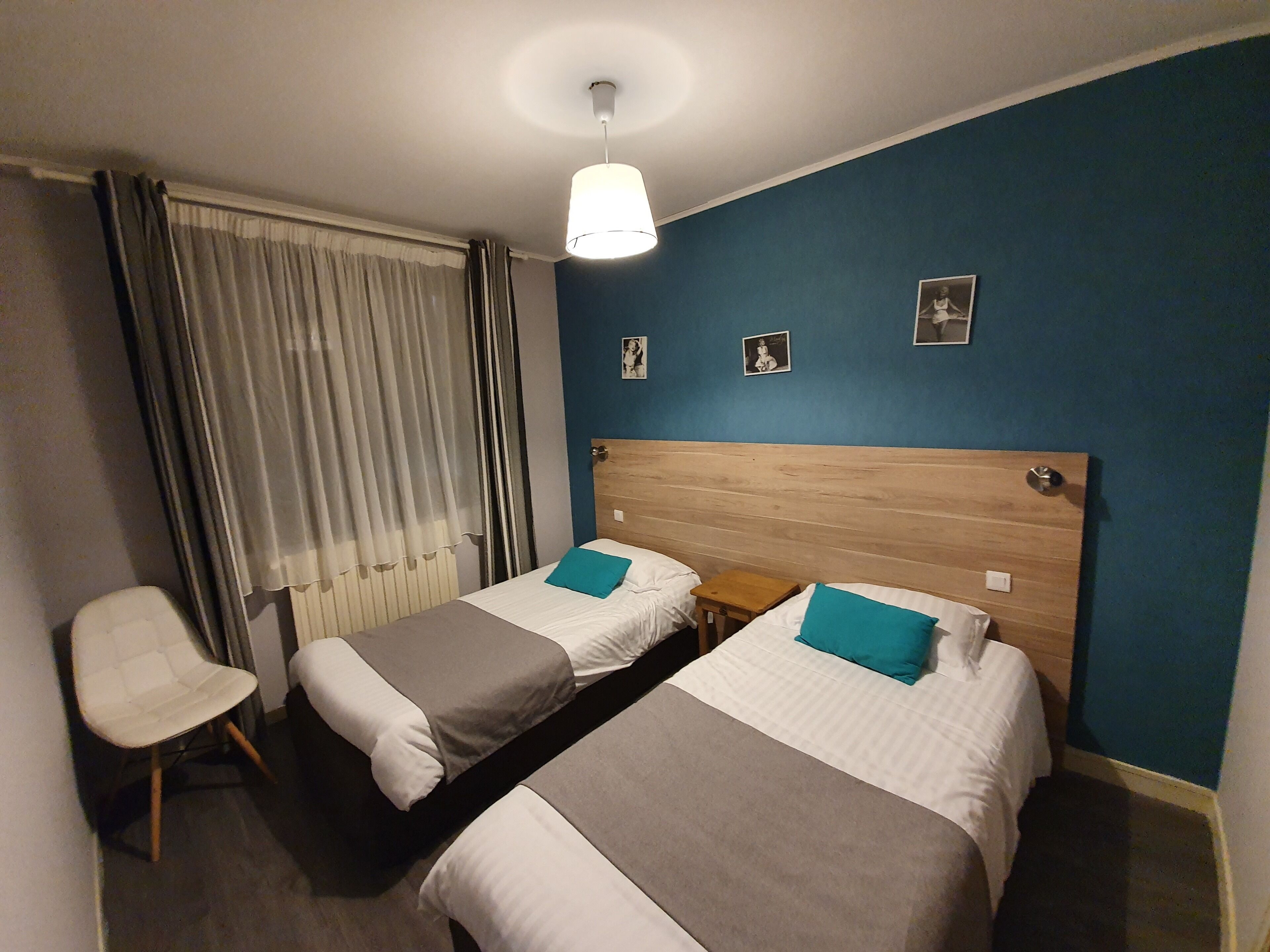 family quadruple room | desk, laptop workspace, blackout curtains, soundproofing