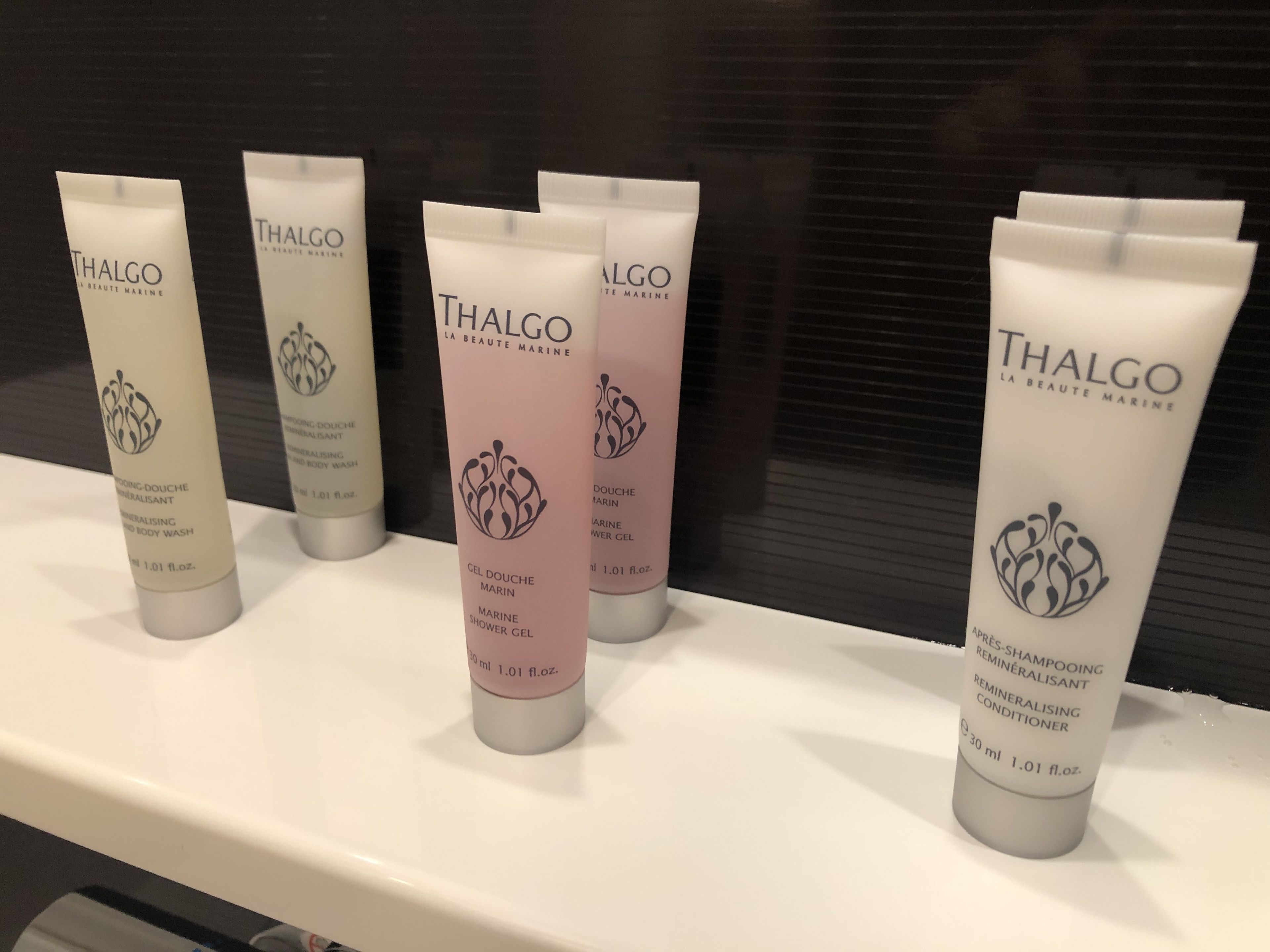 combined shower/bathtub, free toiletries, hair dryer, slippers