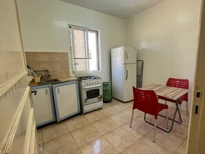Apartment, 1 Bedroom | Private kitchen | Fridge, stovetop, rice cooker, cookware/dishes/utensils - Sami Apartments (Amman)