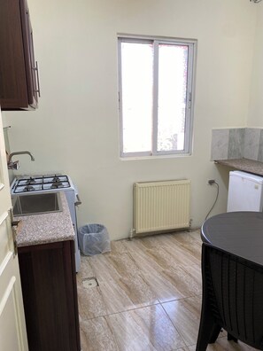 Apartment, 1 Bedroom | Private kitchen | Fridge, stovetop, rice cooker, cookware/dishes/utensils - Sami Apartments (Amman)