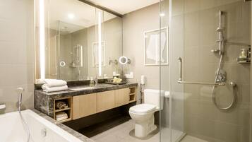 Combined shower/bathtub, free toiletries, hair dryer, bathrobes