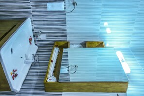 Standard Single Room, 1 Queen Bed, Ensuite | Bathroom | Shower, hair dryer, bathrobes, slippers - Guzara Hotel Addis (Addis Ababa)