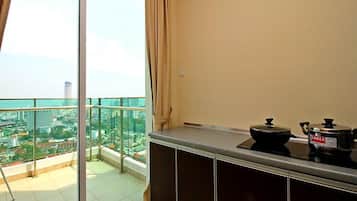 Mansion One Serviced Apartment City View Type D | Private kitchenette | Full-sized fridge, microwave, electric kettle, cookware/dishes/utensils