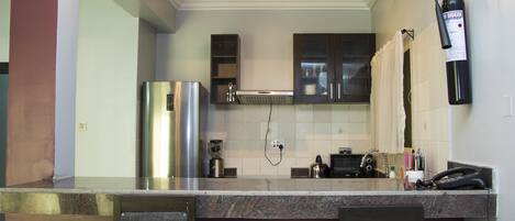 Apartament estàndard, 2 dormitoris | Cuina privada | Frigorífic gran, microones, forn i placa de cuina