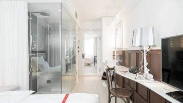 Shower, rainfall showerhead, designer toiletries, hair dryer