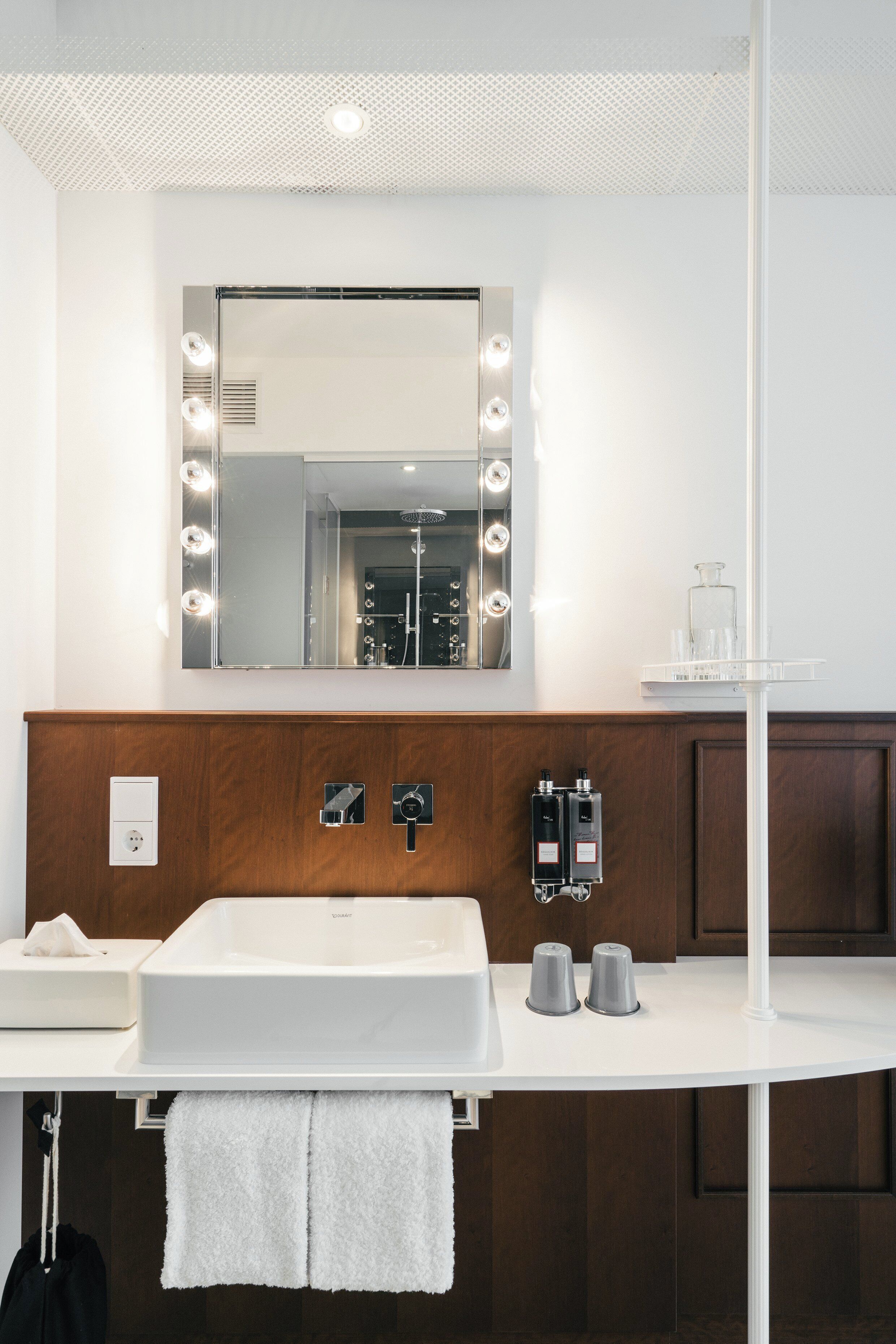 nest room | bathroom | shower, rainfall showerhead, designer toiletries, hair dryer