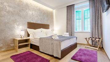 Chambre Double Deluxe | Literie de qualité supérieure, minibar, coffres-forts dans les chambres