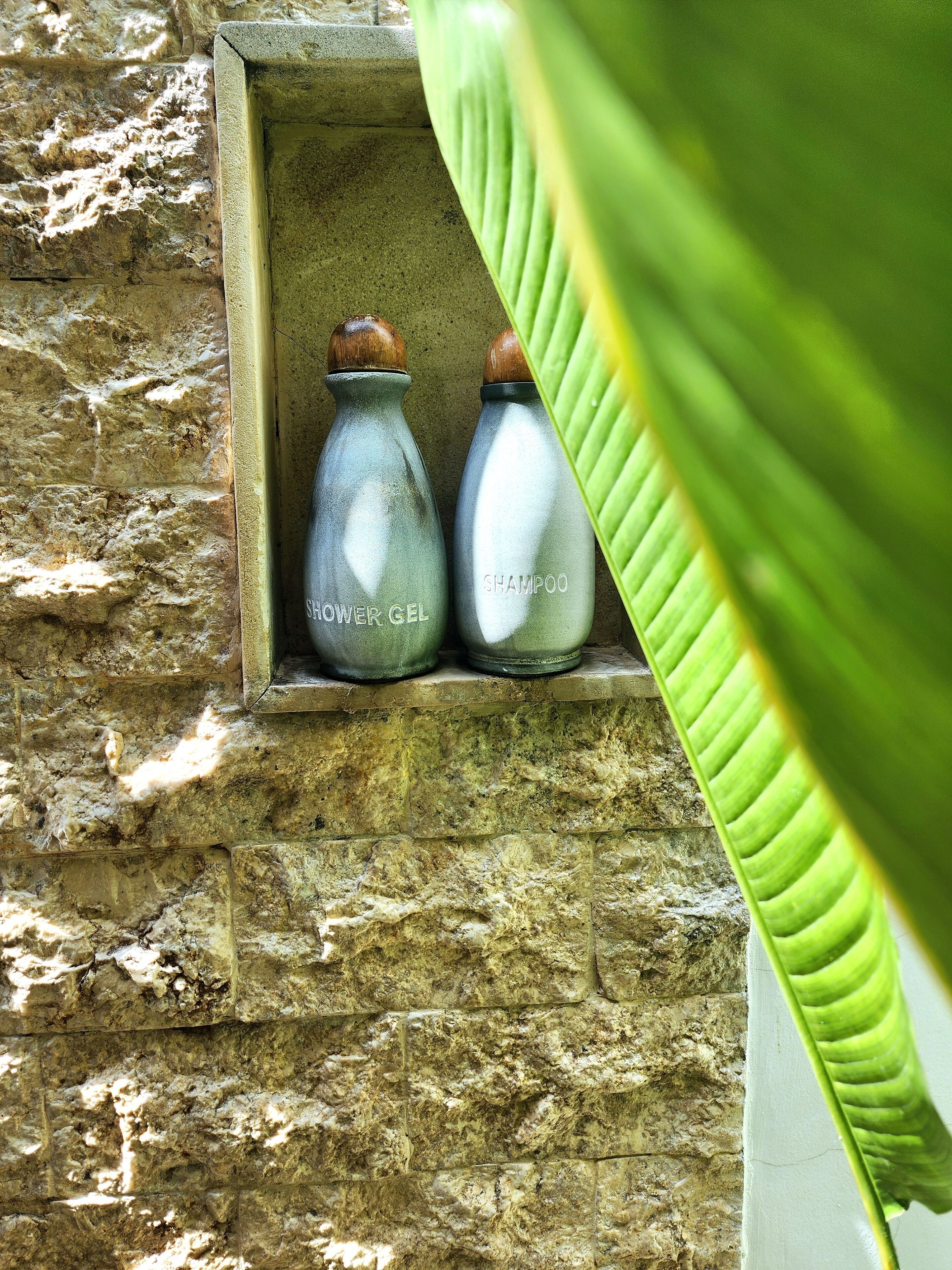 julu suite | bathroom | shower, free toiletries, hair dryer, bathrobes