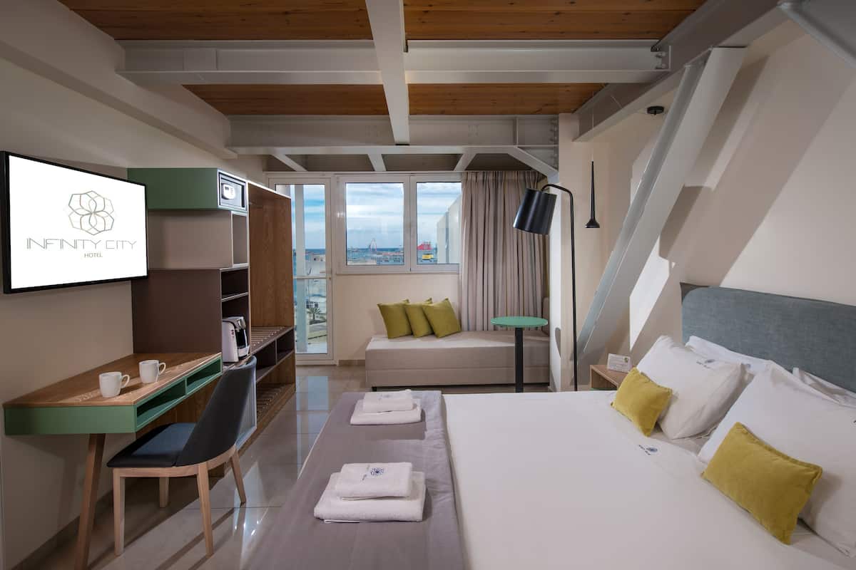 Basic Room, 1 Bedroom, Partial Sea View | Minibar, in-room safe, desk, soundproofing