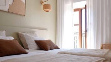 Chambre Double ou avec lits jumeaux | Minibar, bureau, draps fournis