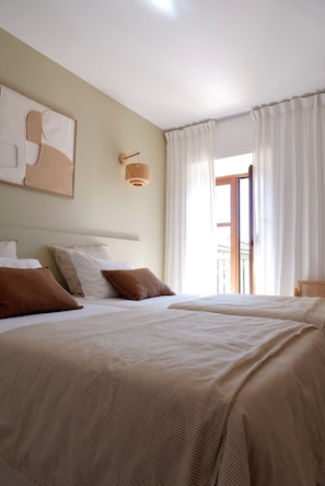 Double or Twin Room | Minibar, desk, bed sheets
