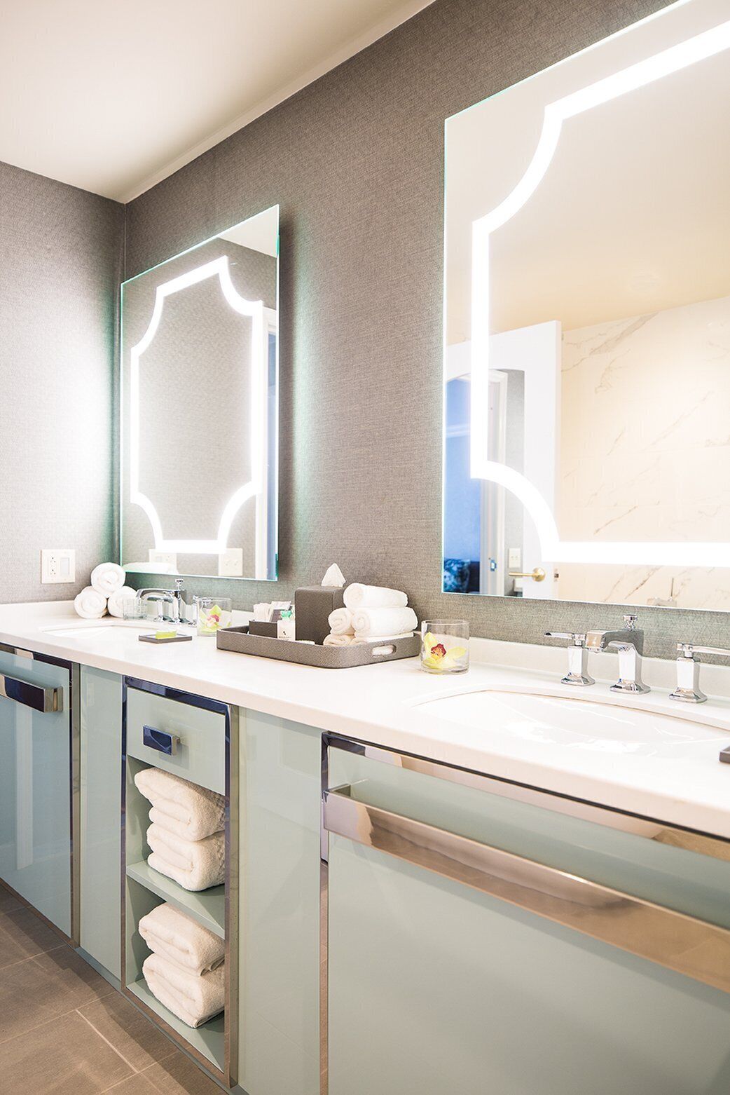 designer toiletries, hair dryer, bathrobes, slippers