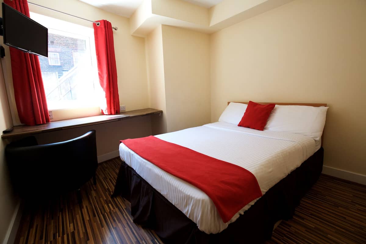 Cortinas blackout, tabla de planchar con plancha y wifi gratis