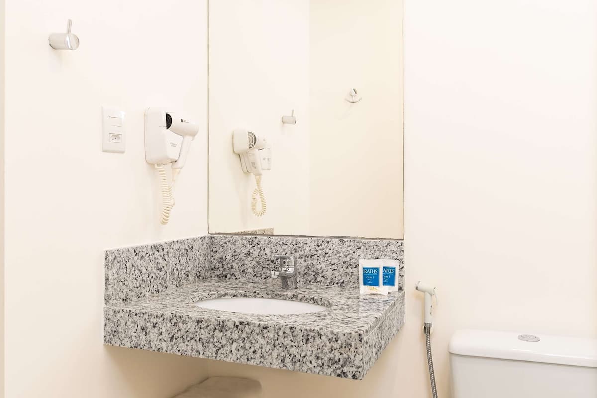 shower, eco-friendly toiletries, hair dryer, towels