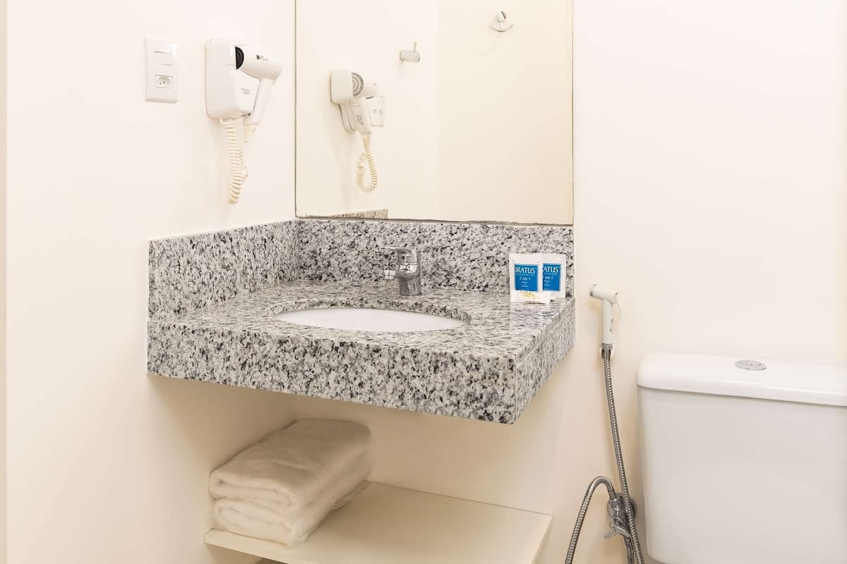 Shower, eco-friendly toiletries, hair dryer, towels