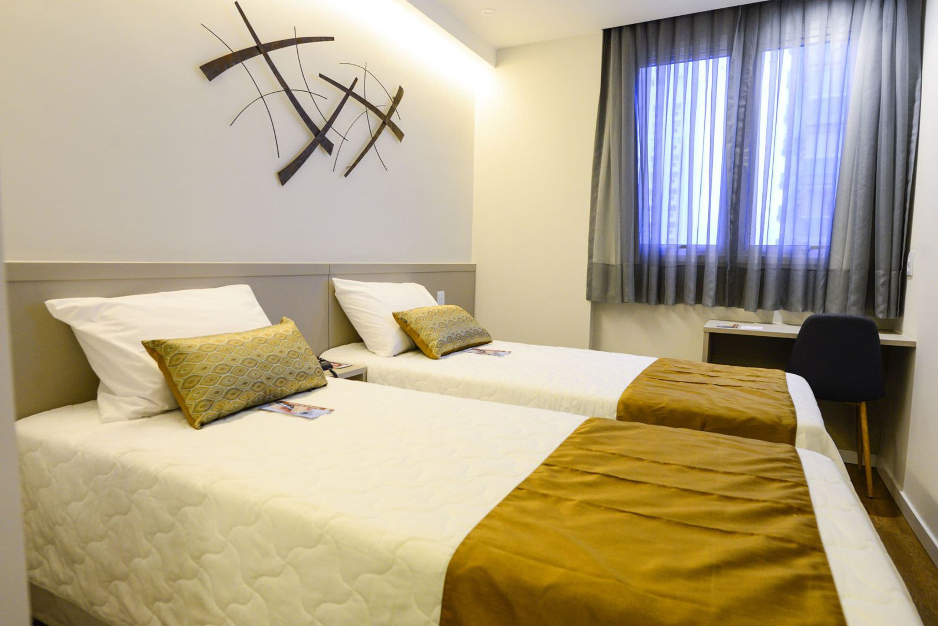 twin room | minibar, in-room safe, desk, soundproofing